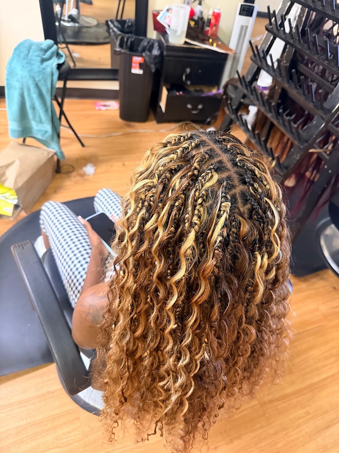 Braids finished with honey-blonde curled ends